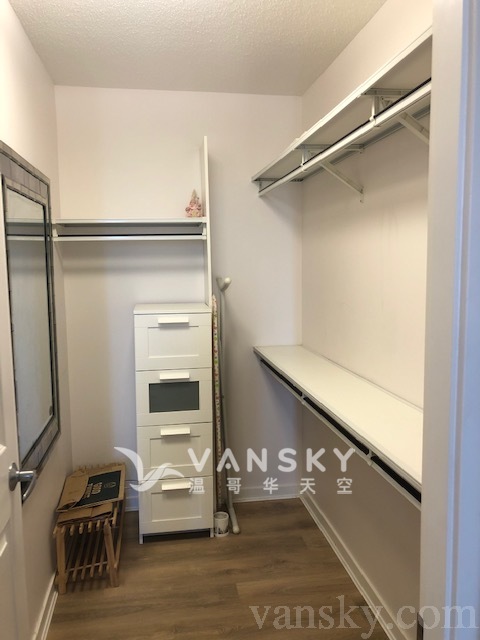 260606115755_master walk-in closet.jpg